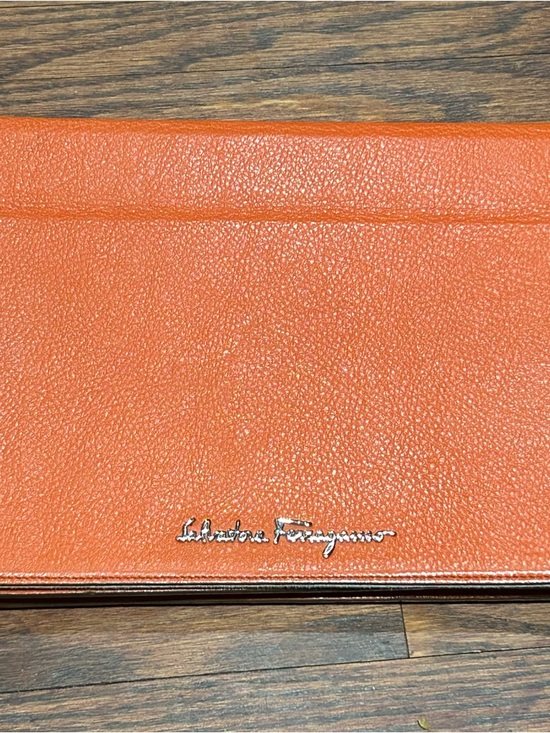 Salvatore Ferragamo Accessories - Salvatore Ferragamo Orange Leather iPad case
Serial number KD-22B420